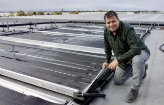 De kas verwarmen met warmte uit water